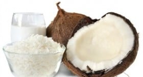 Fresh coconut, shredded coconut, and coconut cream, isolated on white.